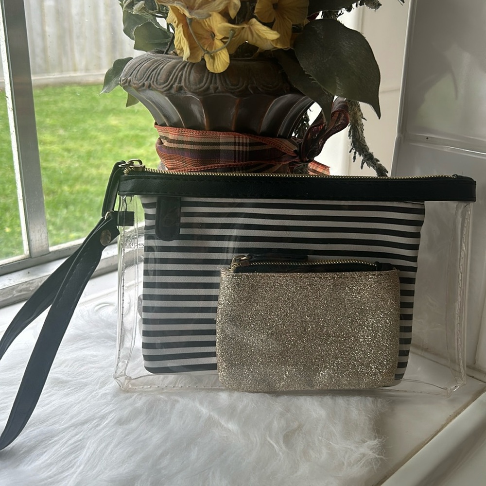 Clear wristlet w/black striped makeup bag and small gold zipped glitter wallet